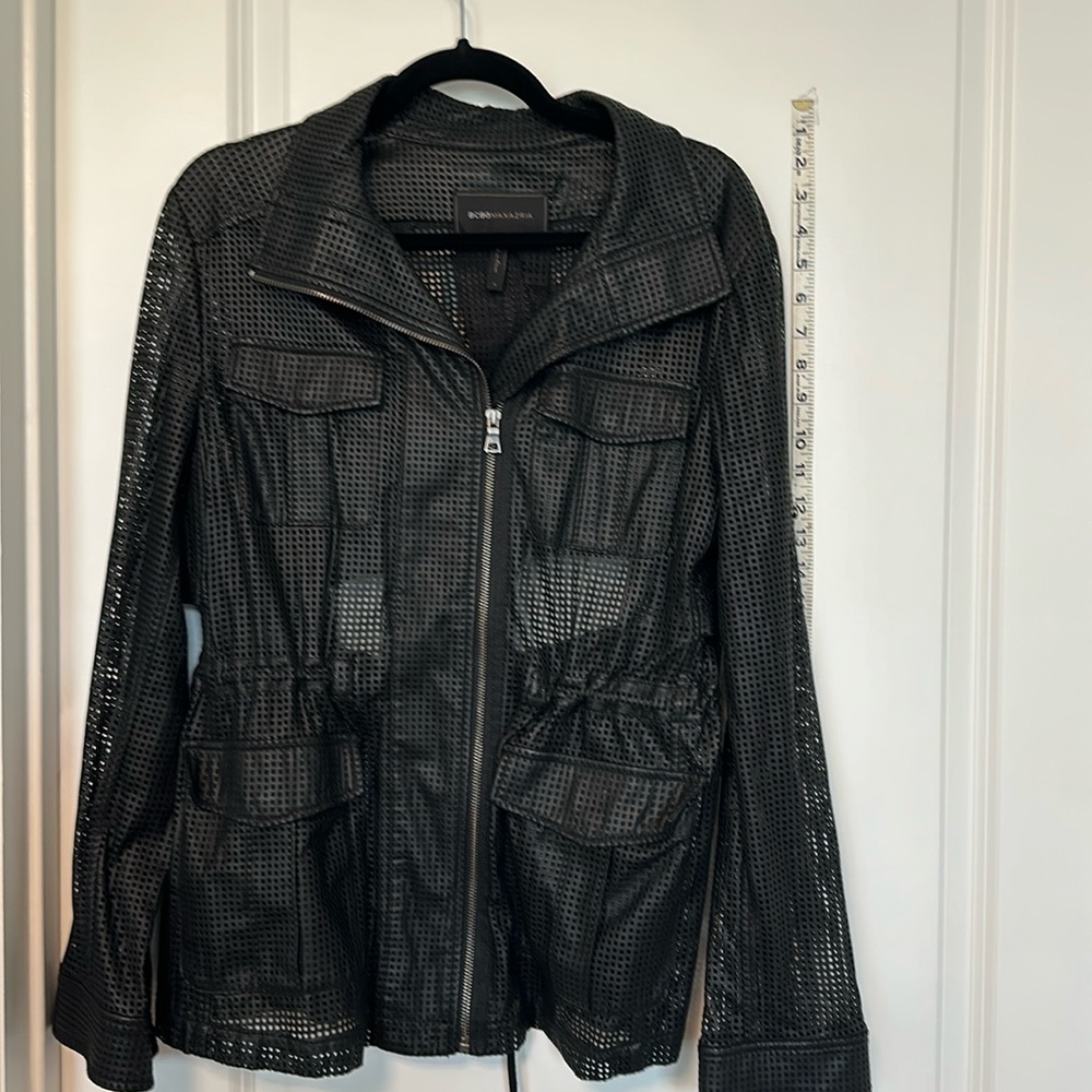 BCBG Maxazria black hole punched jacket. Not necessarily warm, just cool looking